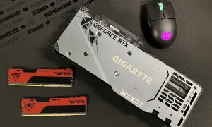 Karta graficzna Gigabyte GeForce RTX, dwa moduły pamięci RAM Viper i myszka komputerowa. Gotowe części komputera do złożenia.