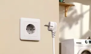 Gniazdko elektryczne i wtyczka gotowe do podłączenia. To symbol prądu zmiennego, który zasila nasze domy.